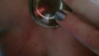 Krystall Cox masturbating using a glass dildo