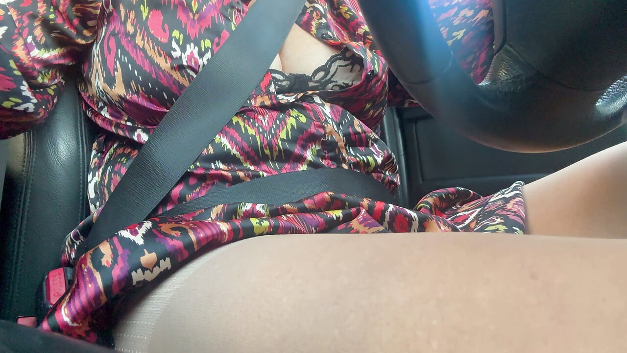 Sexy stepmom drives home and teases us with her big tits, which are practically popping out of her bra.