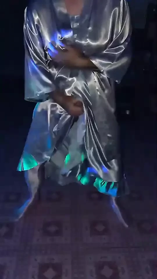 Dancing in a silver gray pajama