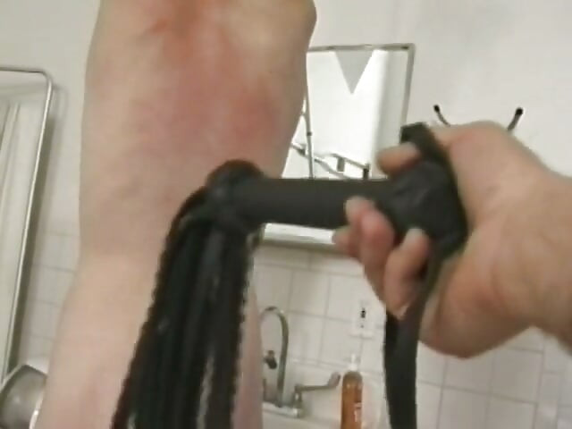 Skinny teen gets whipped on the back while bound