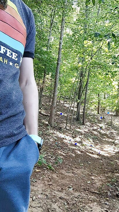 Rubbing myself through my shorts pocket while hiking until I have to stop and cum on the trail
