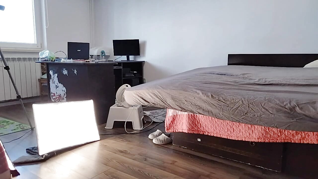 Sexy Latina Having Fun Trying on Clothes and Cutting Them.