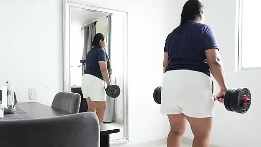 My roommate in a towel asks me to show her the routines at the Gym