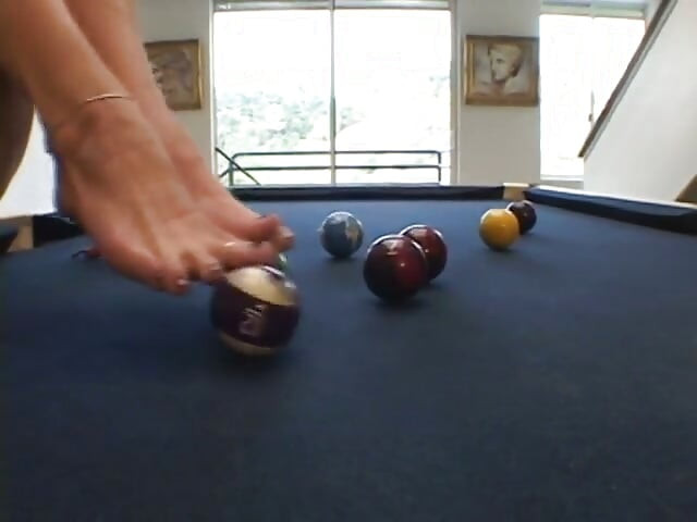 Horny brunette sucks a hard thick cock on the pool table