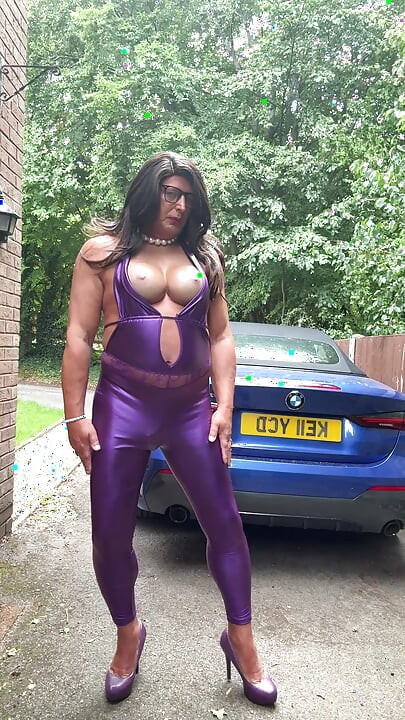 Sexy Crossdresser kellycd2022 in purple pvc catsuit and heels