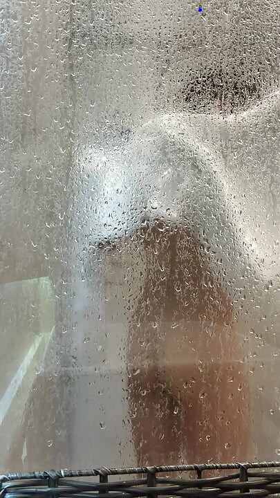 My step cousin came to visit and left the door open while he showered