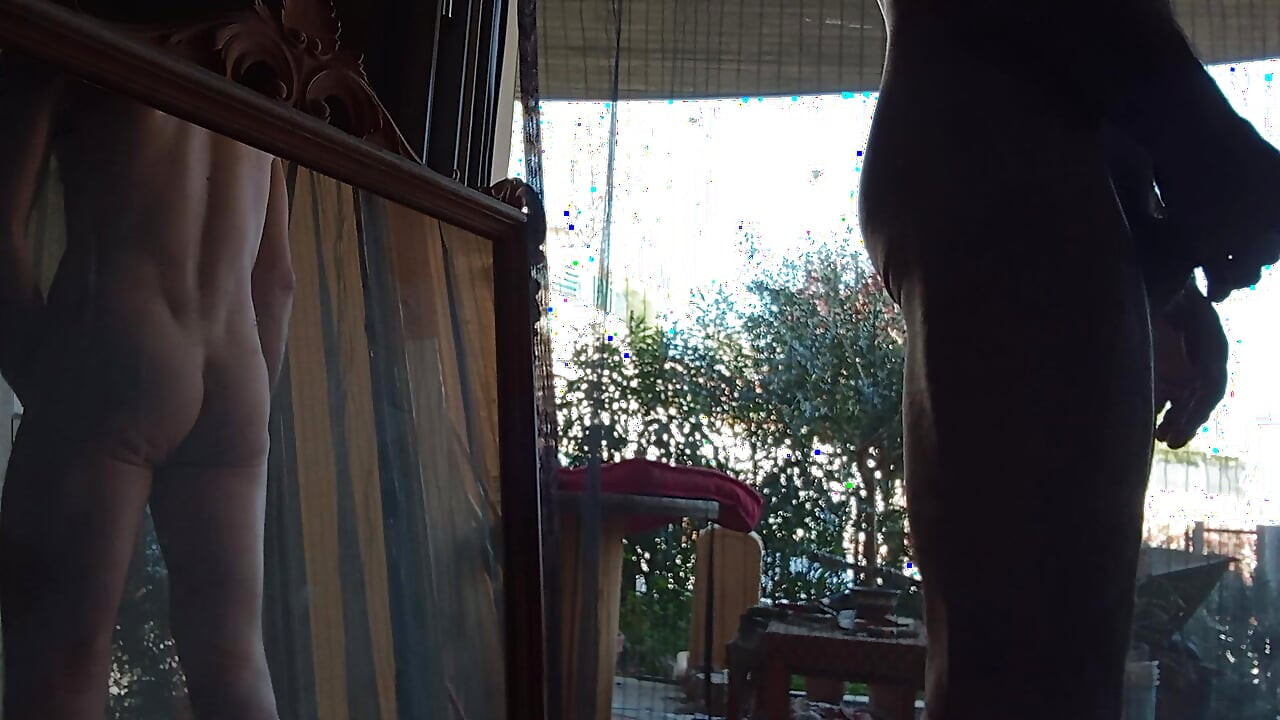 Nice and risky in the mirror on the side of the road