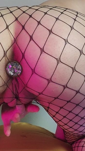 Playing with my buttplug in fishnets