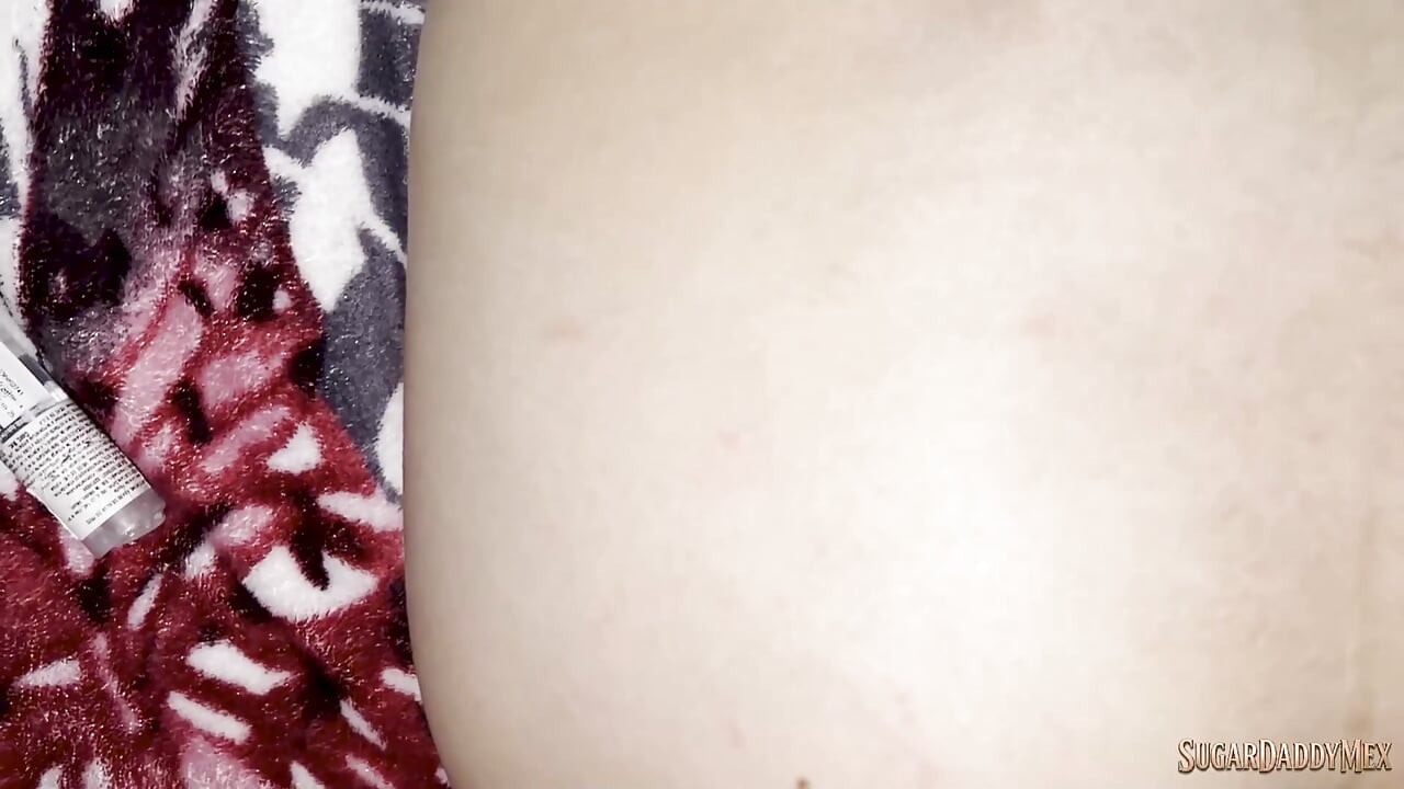Dulce loves double penetration — dildo in her pussy and deep cock in the ass on the bed while screaming