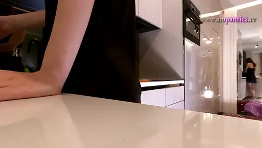 Hot sexy long legs brunette wife in black and red fishnet stockings with a satin nightie teases in the kitchen