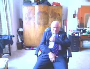 Older men shoot on his suit