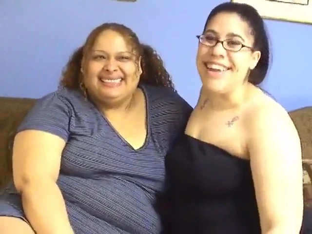 Two fat girls enjoy some fine dining in by sucking tits and pussies