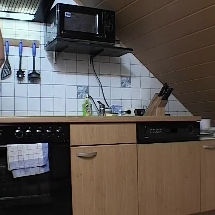 Busty Brunette MILF Masturbates Wildly with Kitchen Objects