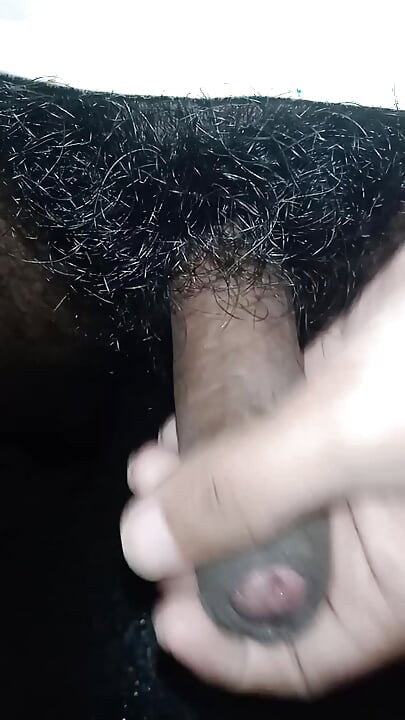 Masturbating hairy cock with small balls