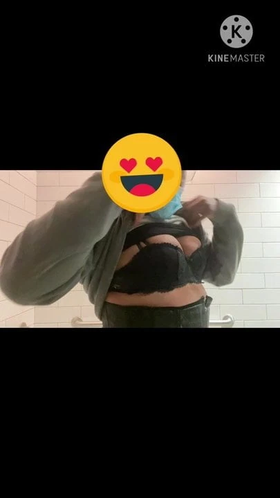 Busty black Crossdresser teases in public bathroom