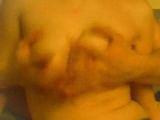 massage tits from behind