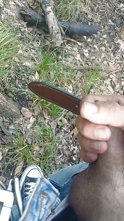 Jacking off in a public park