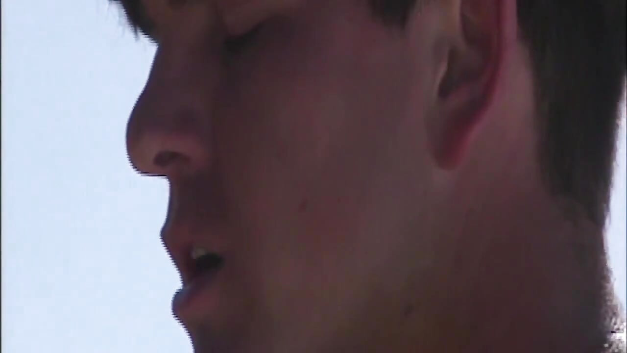 She Lies Naked on the Beach While He Watches Her