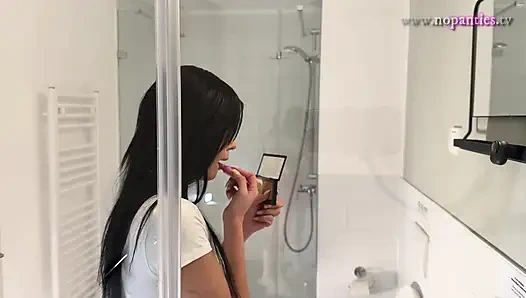 Hot sexy slim tight pussy beauty in the bathroom prepares for night out in a pink cut mini skirt