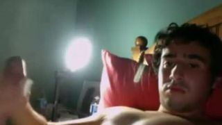 Horny young dude shoots a big cum load after masturbation