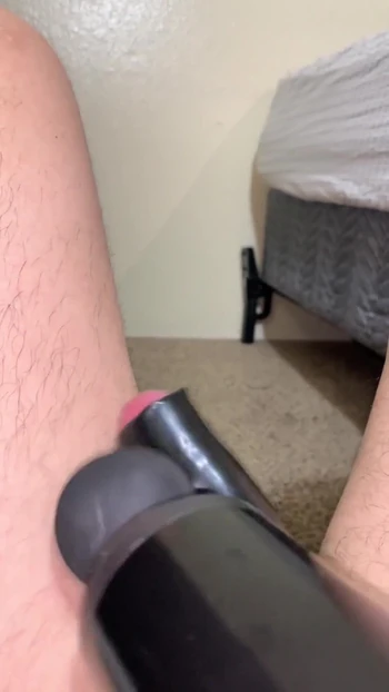 Thrilling moment from "Latex Sheath Cumshot with a Massage Gun"