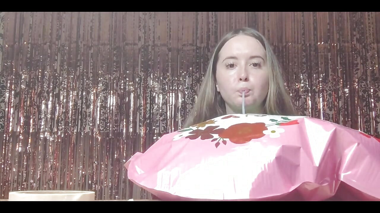 Getting Ready for Valentine's Day by Inflating Balloons