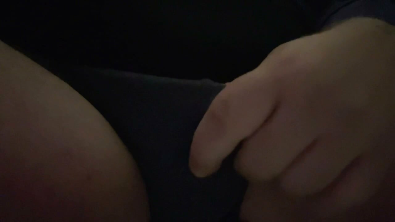 Fat gay man jerks off his small cock in a public restroom.