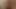 Masturbating my pussy while I'm sitting on the couch watching tv