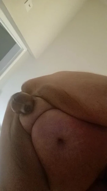 Mofo2121 on all fours pushing out his huge butt plug