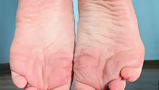 Custom Video for Bruno Feet on the Floor, Scrunching Toes and Showing Wrinkled Clean Soles Close to the Camera