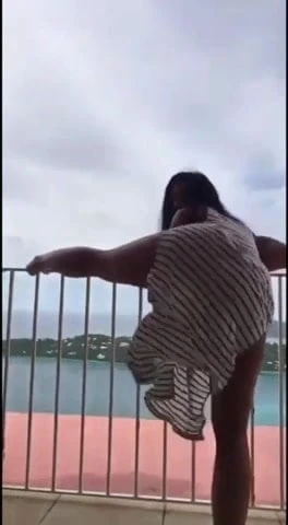 Hot girl dancing on balcony