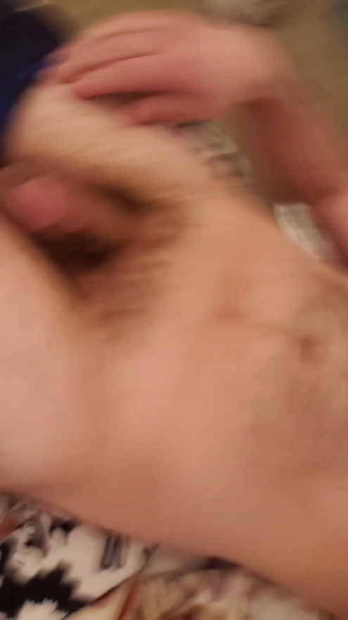Laying Naked flaccid penis just starting to get erect