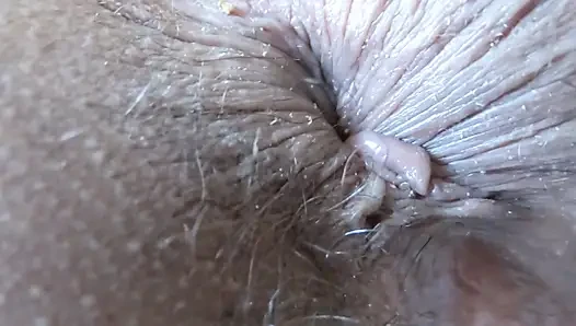 Enjoying my stepmother's big pussy and ass, she writhes with pleasure and begs me to fuck her.