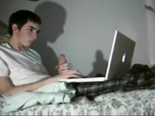 Chłopiec laptopa z ogromnym obciążeniem kutasa