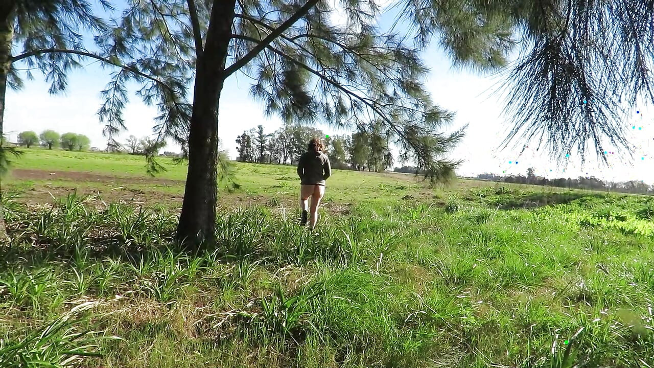 Patricia and her ass walks among the pines