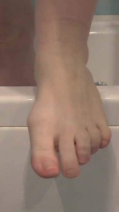Key moment from "Mature feet in soapy foam. Amateur foot fetish close-up. ASMR."