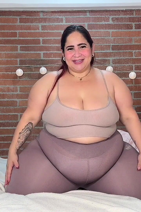 Massage on the Big Belly of a Robust Woman on the Bed: Voluminous Wobbly Belly and Body Caresses.