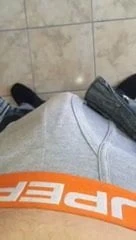 Releasing my hard white cock from my boxers