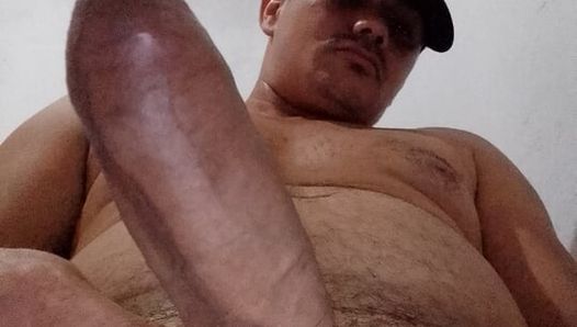 man with a giant dick masturbating