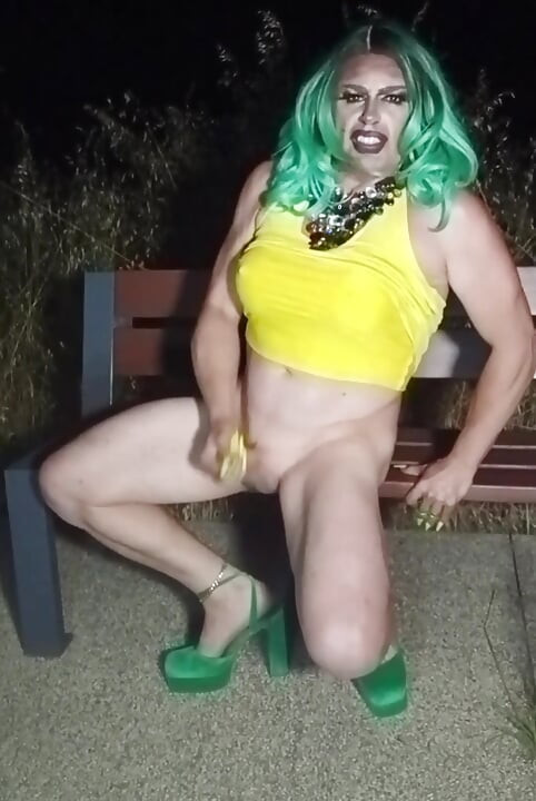 Sexy mature transvestite slut party summer showing off in a public park