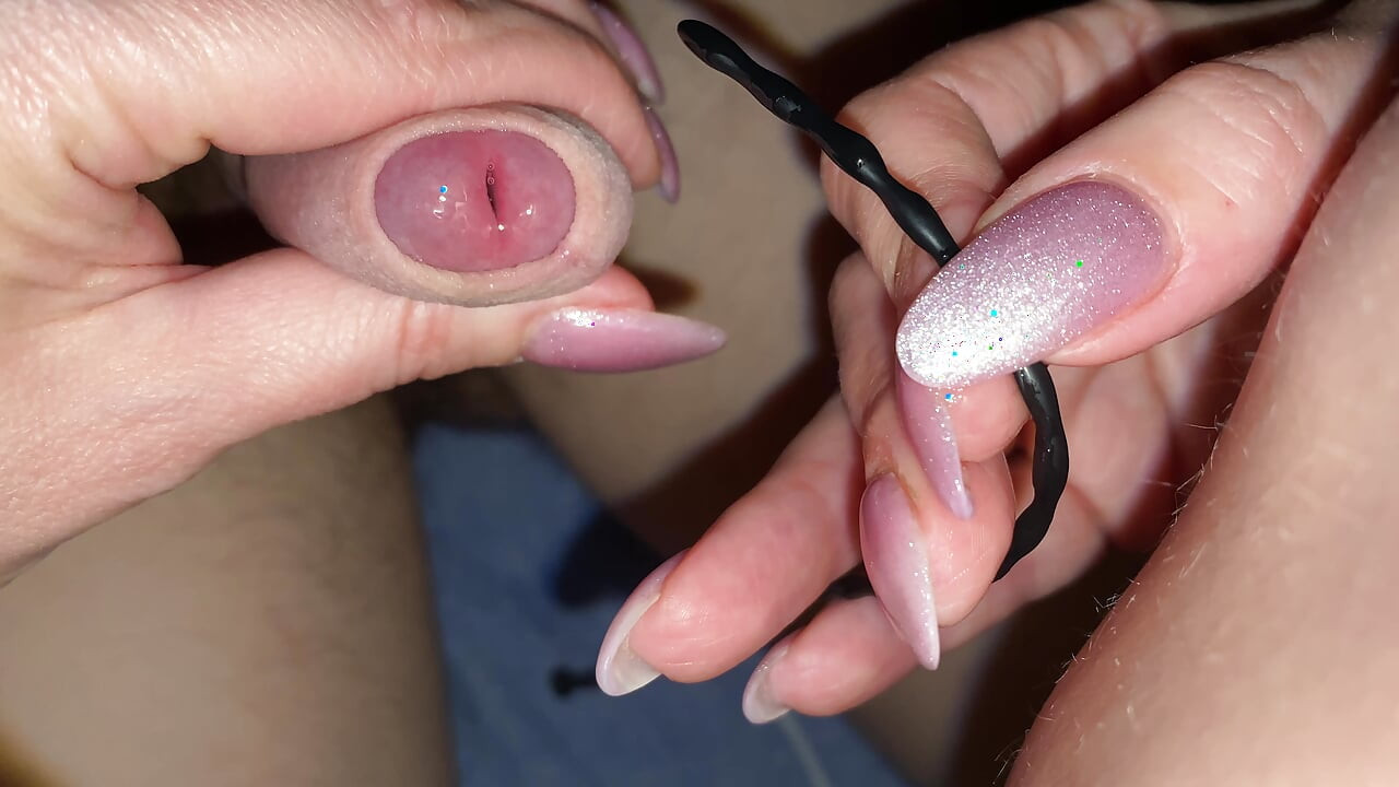 For the first time an urogenital probe is inserted into the pe nus for the first time, the man is moaning