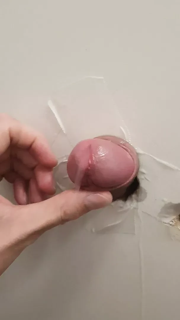 Cumshot at glory hole