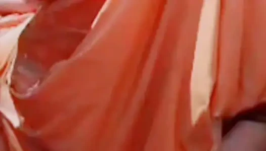 While bathing, the village woman is taking a bath naked after taking off her clothes completely