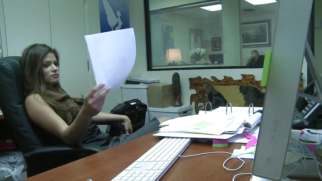 Long haired slut riding a dick on the office desk