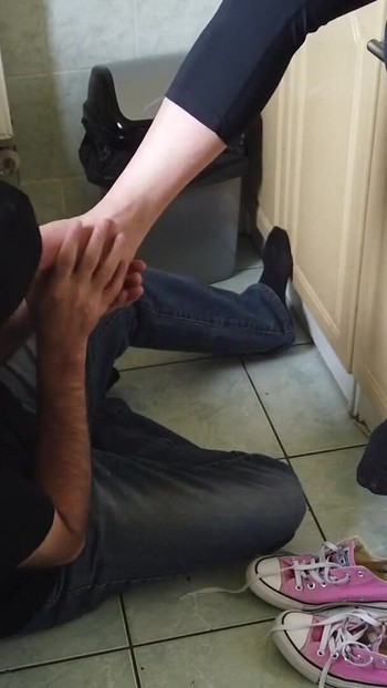 Emotional moment from "Foot worship in the kitchen for a MILF"