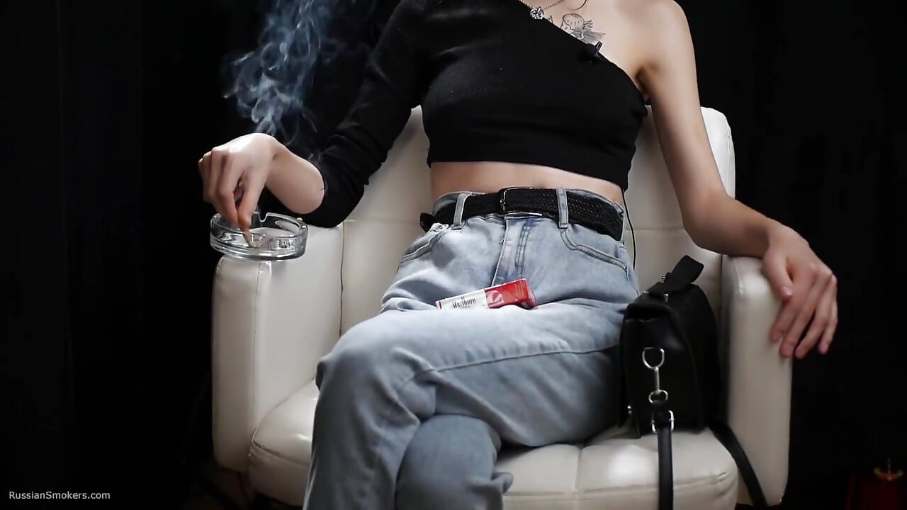 Slim Chick Is Smoking Two Reds