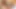 Redhead ladyboy in green bra jerks off her hairy dick in bed