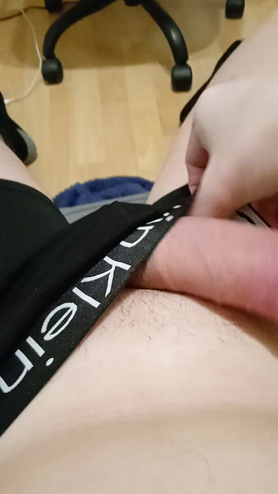Handsome guy jerking off at home