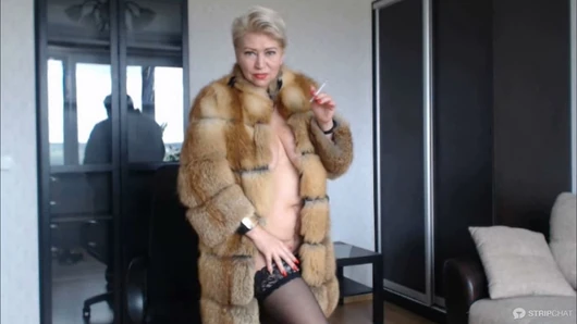 Hot sexy Russian MILF slut in a fur coat and a cigarette...