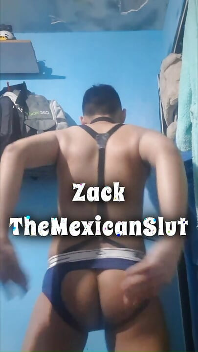 A young man masturbates by jerking his penis.